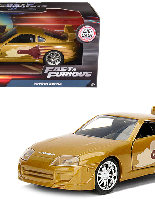 Load image into Gallery viewer, Slap Jack's Toyota Supra Gold "Fast &amp; Furious" Movie 1/32 Diecast Model Car by Jada

