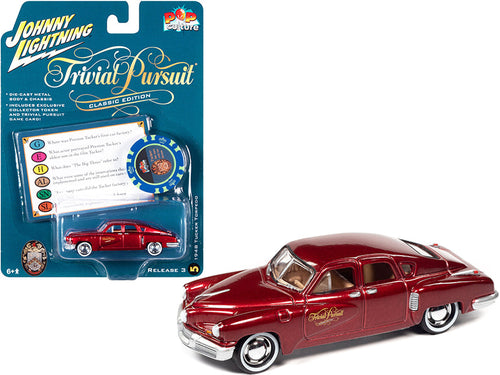 Load image into Gallery viewer, 1948 Tucker Torpedo Red Maroon Metallic "Tucker: The Man and His Dream" (1988) Movie with Poker Chip (Collector Token) and Game Card "Trivial Pursuit" "Pop Culture" Series 3 1/64 Diecast Model Car by Johnny Lightning

