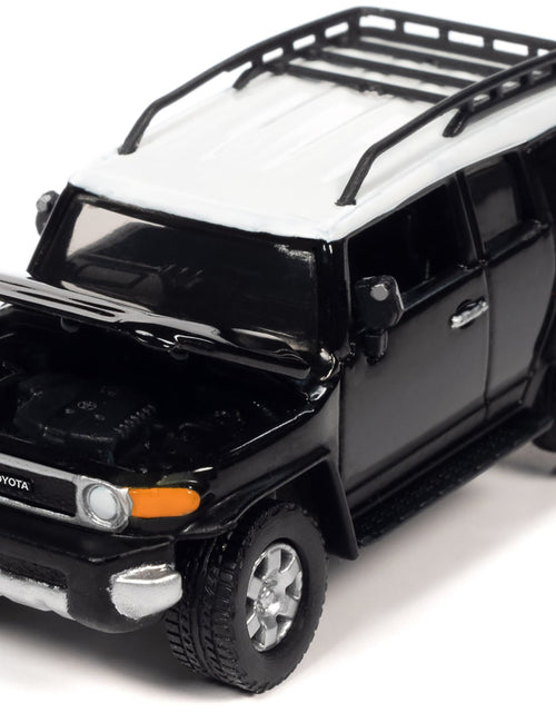 Load image into Gallery viewer, 2007 Toyota FJ Cruiser Black Diamond with White Top and Roofrack "Classic Gold Collection" Series Limited Edition 1/64 Diecast Model Car by Johnny Lightning
