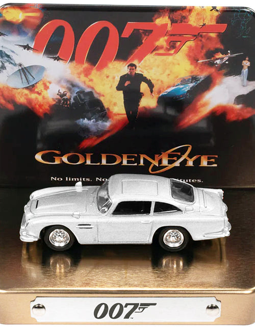 Load image into Gallery viewer, Aston Martin DB5 RHD (Right Hand Drive) Silver Metallic 007 (James Bond) "GoldenEye" (1995) Movie with Collectible Tin Display "Silver Screen Machines" Series 1/64 Diecast Model Car by Johnny Lightning
