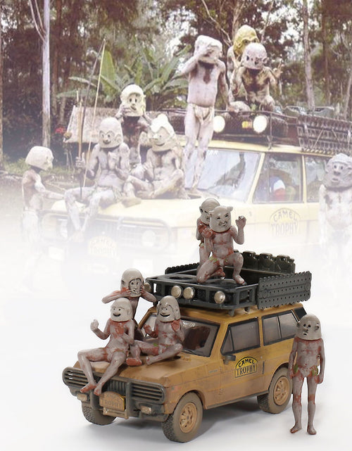 Load image into Gallery viewer, Range Rover with Roofrack Tan (Dirty Version) "Camel Trophy - Papua New Guinea Team USA" (1982) with "Papua New Guinea Asaro Mudmen" 6 piece Figure Set 1/64 Diecast Model Car by True Scale Miniatures
