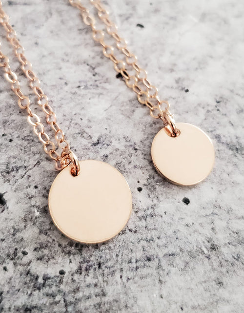 Load image into Gallery viewer, Minimalist Daisy Charm Necklace by Salt and Sparkle
