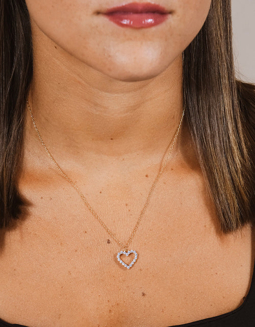 Load image into Gallery viewer, Sterling Silver Cubic Zirconia Outline Heart Pendant Necklace by Sterling Forever
