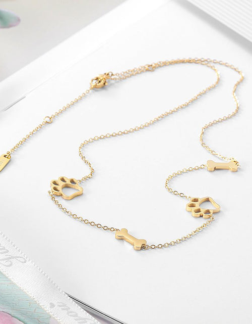 Load image into Gallery viewer, Puppy Paw and Bone Necklace by Furr Baby Gifts
