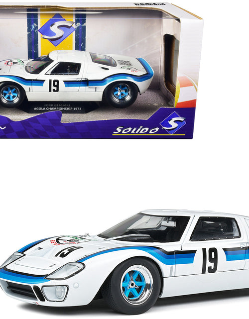 Load image into Gallery viewer, Ford GT40 MK.1 RHD (Right Hand Drive) #19 Emilio Marta "Angola Championship" (1973) "Competition" Series 1/18 Diecast Model Car by Solido
