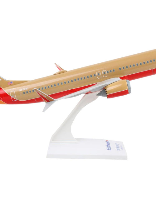 Load image into Gallery viewer, Boeing 737 MAX 8 Commercial Aircraft "Southwest Airlines" (N572UP) Tan with Red and Orange Stripes (Snap-Fit) 1/130 Plastic Model by Skymarks

