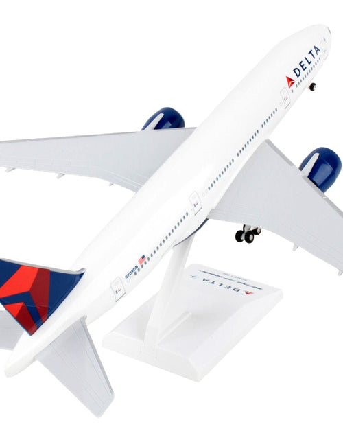 Load image into Gallery viewer, Boeing 777-200 Commercial Aircraft with Landing Gear "Delta Air Lines" (N709DN) White with Blue and Red Tail (Snap-Fit) 1/200 Plastic Model by Skymarks
