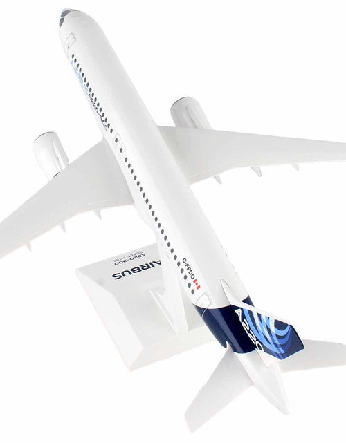 Load image into Gallery viewer, Airbus A220-300 Commercial Aircraft "Airbus" (C-FFDO) White with Blue Tail (Snap-Fit) 1/100 Plastic Model by Skymarks
