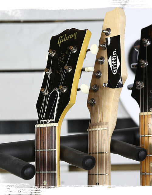 Load image into Gallery viewer, Five Guitar Rack Stand by GRIFFIN - Holder for 5 Guitars &amp; Folds Up For Transport Neoprene Padding by GeekStands.com
