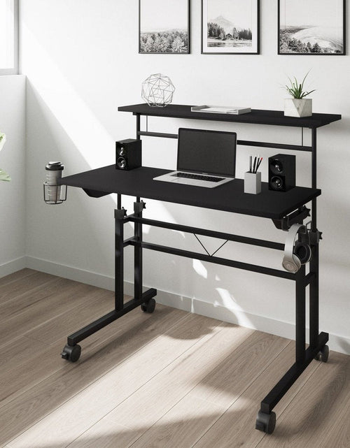 Load image into Gallery viewer, Techni Mobili Rolling Writing Desk with Height Adjustable Desktop and Moveable Shelf, Black by Level Up Desks
