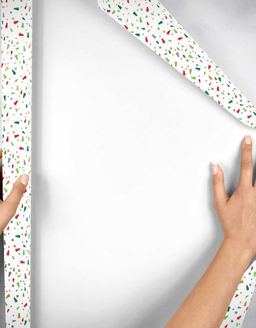 Load image into Gallery viewer, Embossed Little Trees Christmas Gift Wrap by Present Paper

