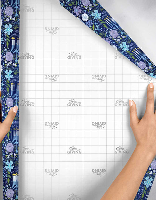 Load image into Gallery viewer, Floral Menorah Hanukkah Gift Wrap by Present Paper
