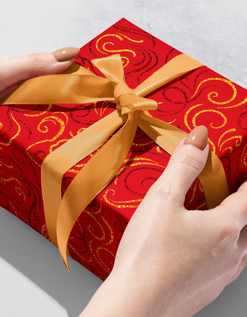 Load image into Gallery viewer, Red Gold Swirls Holographic Christmas Gift Wrap by Present Paper
