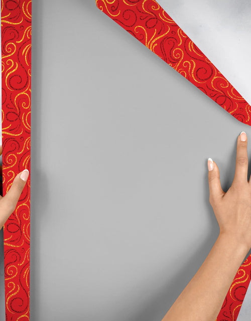 Load image into Gallery viewer, Red Gold Swirls Holographic Christmas Gift Wrap by Present Paper
