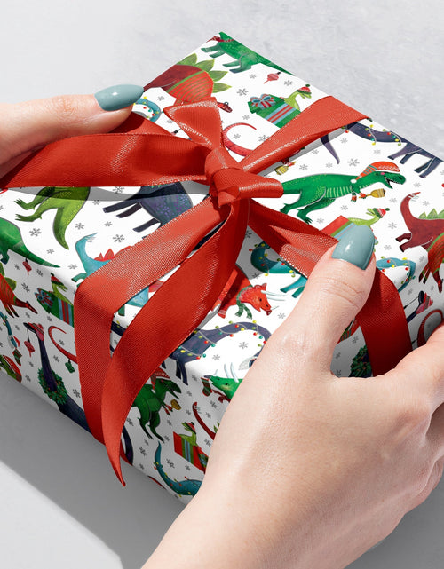 Load image into Gallery viewer, Decked Out Dinosaur Christmas Gift Wrap by Present Paper
