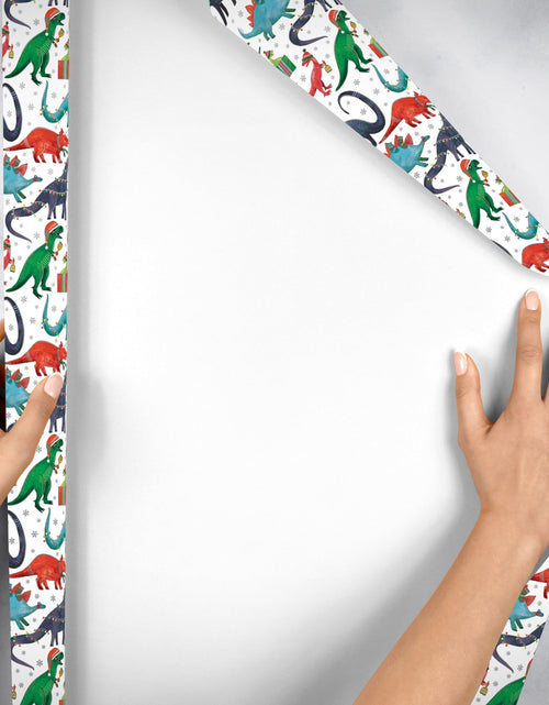 Load image into Gallery viewer, Decked Out Dinosaur Christmas Gift Wrap by Present Paper
