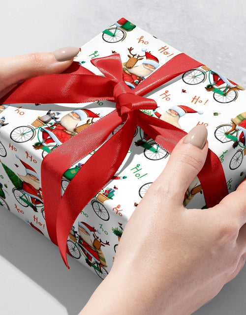 Load image into Gallery viewer, Santa Bicycle Christmas Gift Wrap by Present Paper
