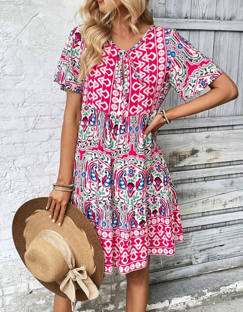 Load image into Gallery viewer, Printed Tie Neck Short Sleeve Dress
