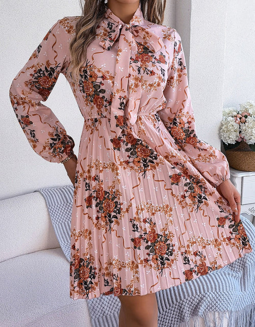Load image into Gallery viewer, Pleated Printed Tie Neck Long Sleeve Dress
