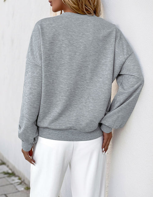 Load image into Gallery viewer, Perfee Cutout Pearl Round Neck Long Sleeve Sweatshirt

