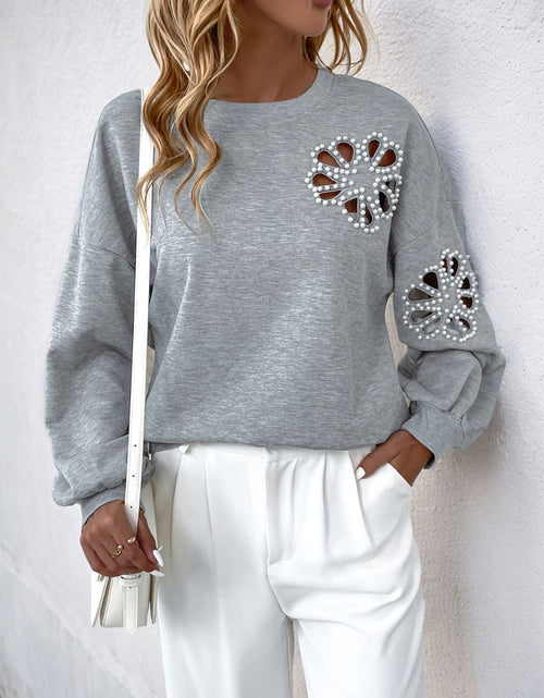 Load image into Gallery viewer, Perfee Cutout Pearl Round Neck Long Sleeve Sweatshirt
