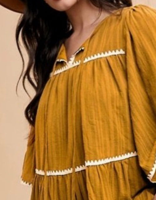 Load image into Gallery viewer, Annie Wear Tassel Contrast Trim Tie Neck Half Sleeve Tiered Dress
