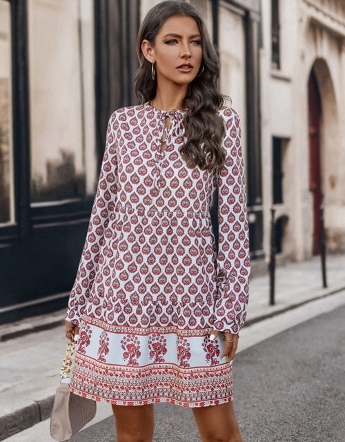 Load image into Gallery viewer, Printed Tie Neck Long Sleeve Dress
