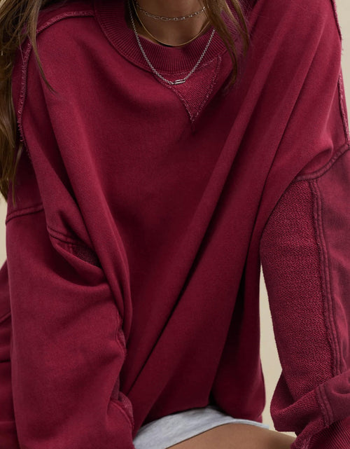 Load image into Gallery viewer, Side Slit Round Neck Long Sleeve Sweatshirt
