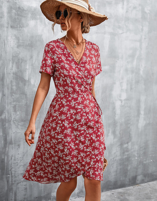 Load image into Gallery viewer, Floral Surplice Neck Flutter Sleeve Dress
