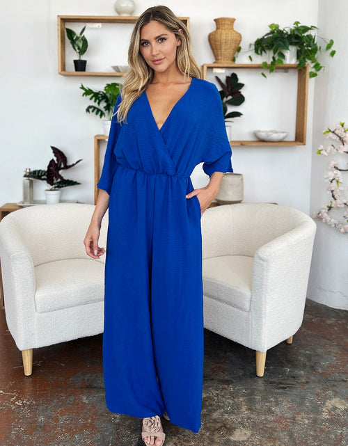 Load image into Gallery viewer, Double Take Full Size Surplice Wide Leg Jumpsuit with Pockets
