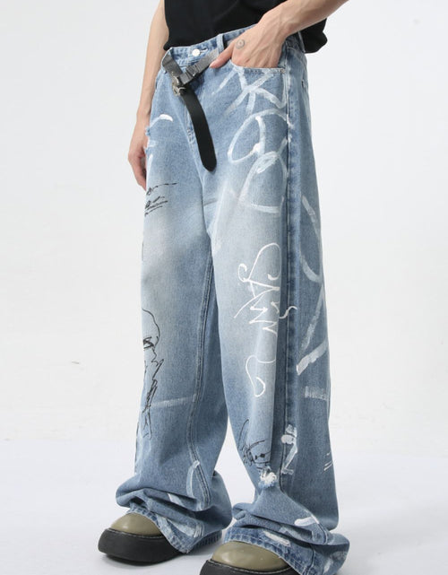 Load image into Gallery viewer, Mid Rise Graffiti Print Distressed Wide Leg Jeans
