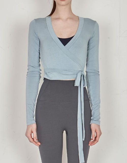 Load image into Gallery viewer, Tied Surplice Long Sleeve Top
