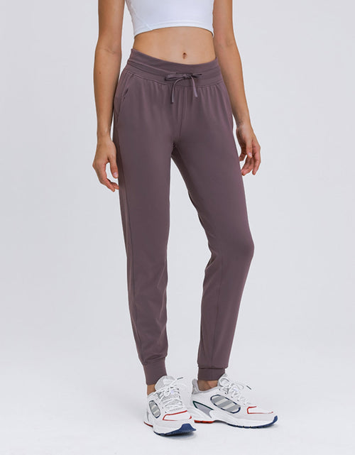 Load image into Gallery viewer, Millennia Double Take Tied Joggers with Pockets
