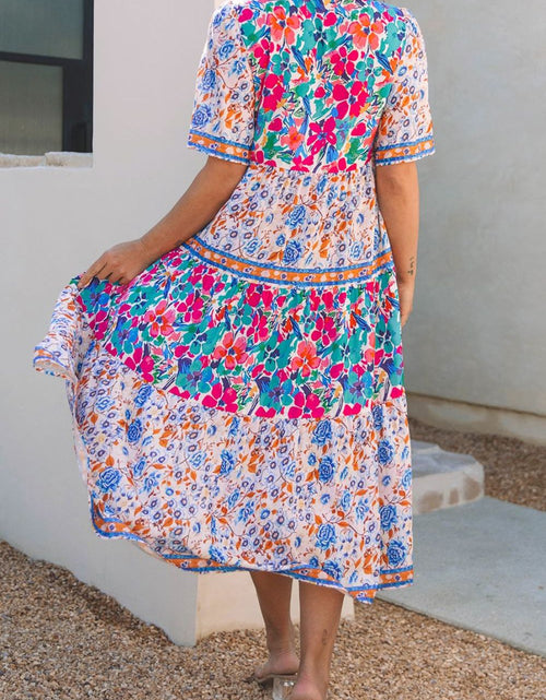 Load image into Gallery viewer, Mixed Floral Print Tie Neck Short Sleeve Dress
