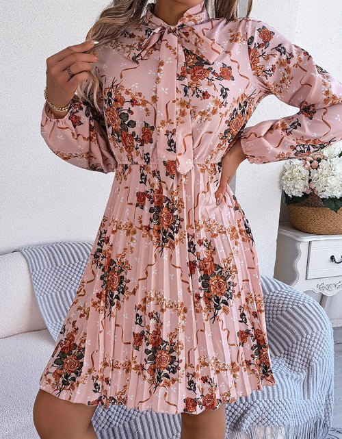 Load image into Gallery viewer, Pleated Printed Tie Neck Long Sleeve Dress
