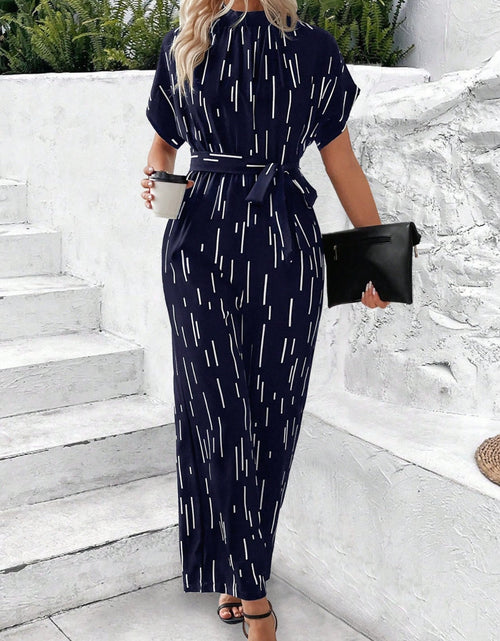 Load image into Gallery viewer, Tied Printed Mock Neck Wide Leg Jumpsuit

