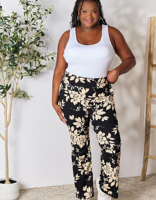 Load image into Gallery viewer, Heimish Full Size High Waist Floral Flare Pants
