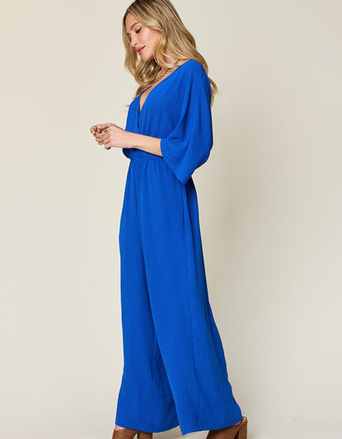 Load image into Gallery viewer, Double Take Full Size Surplice Wide Leg Jumpsuit with Pockets
