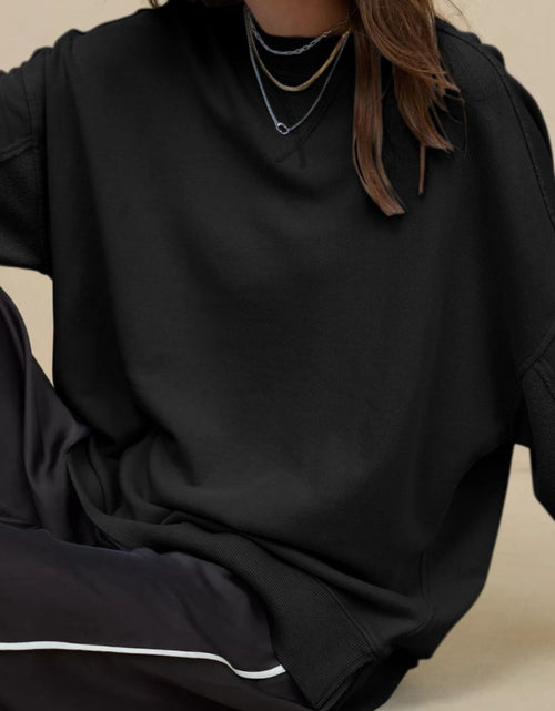 Load image into Gallery viewer, Side Slit Round Neck Long Sleeve Sweatshirt
