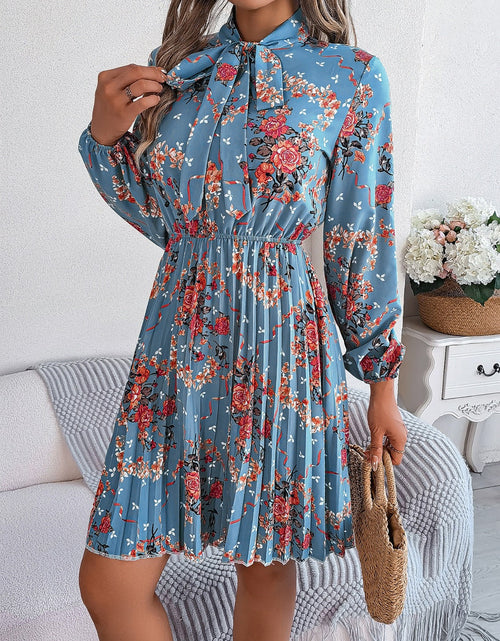 Load image into Gallery viewer, Pleated Printed Tie Neck Long Sleeve Dress
