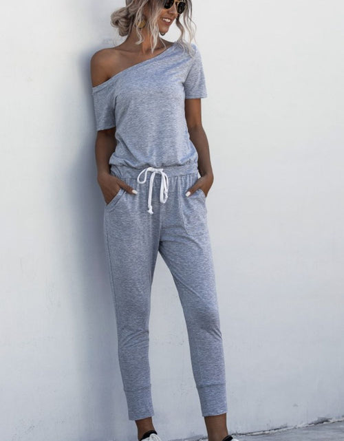 Load image into Gallery viewer, Asymmetrical Neck Tied Jumpsuit with Pockets

