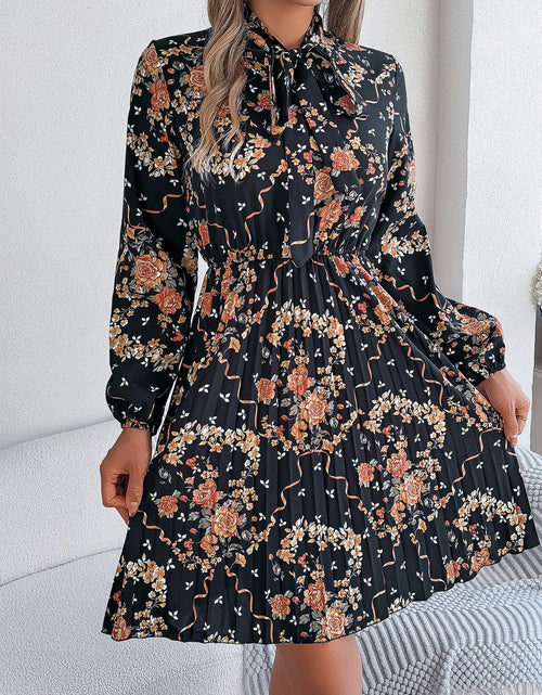 Load image into Gallery viewer, Pleated Printed Tie Neck Long Sleeve Dress
