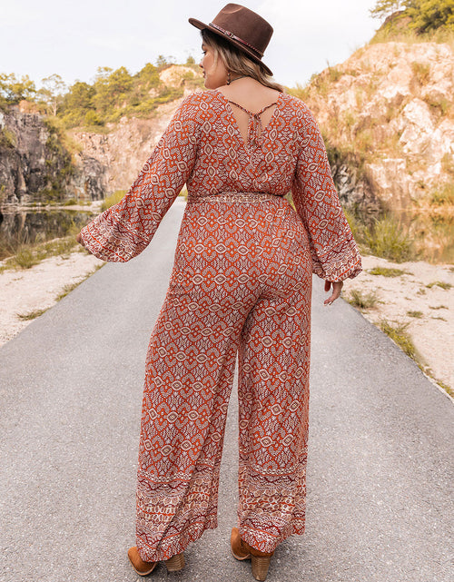 Load image into Gallery viewer, Plus Size Printed V-Neck Tie Front Balloon Sleeve Jumpsuit
