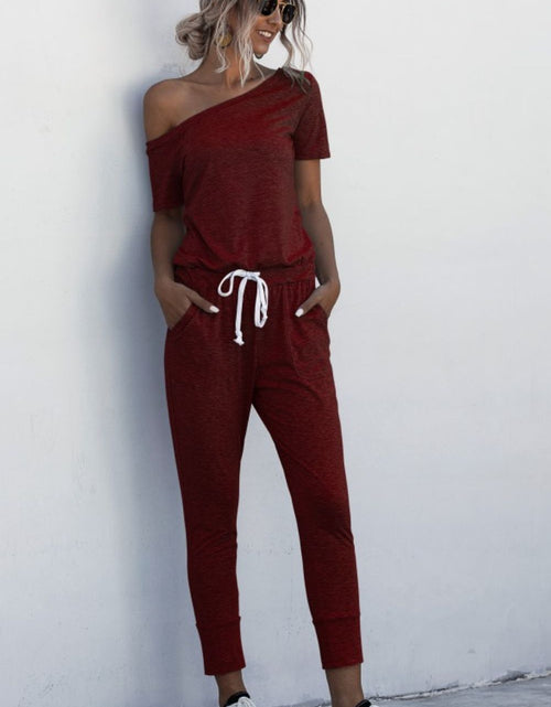 Load image into Gallery viewer, Asymmetrical Neck Tied Jumpsuit with Pockets
