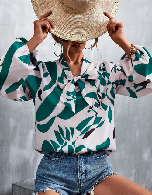 Load image into Gallery viewer, Printed Tie Neck Puff Sleeve Blouse
