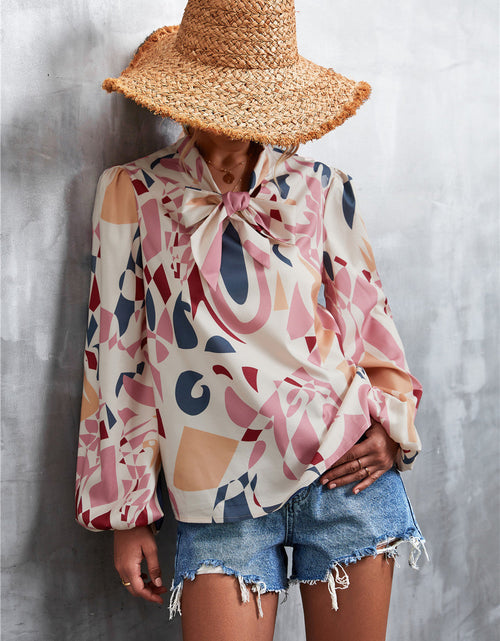 Load image into Gallery viewer, Printed Tie Neck Puff Sleeve Blouse
