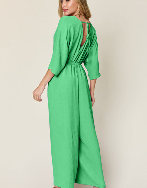 Load image into Gallery viewer, Double Take Full Size Surplice Wide Leg Jumpsuit with Pockets
