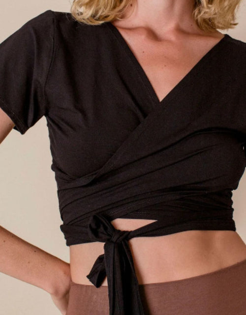 Load image into Gallery viewer, Tied Surplice Short Sleeve Top
