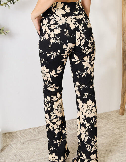 Load image into Gallery viewer, Heimish Full Size High Waist Floral Flare Pants
