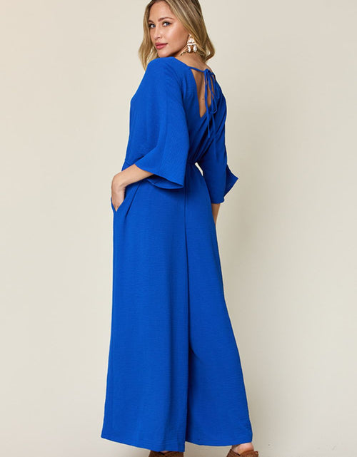 Load image into Gallery viewer, Double Take Full Size Surplice Wide Leg Jumpsuit with Pockets
